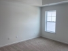 Primary Bedroom w/ coffered ceiling